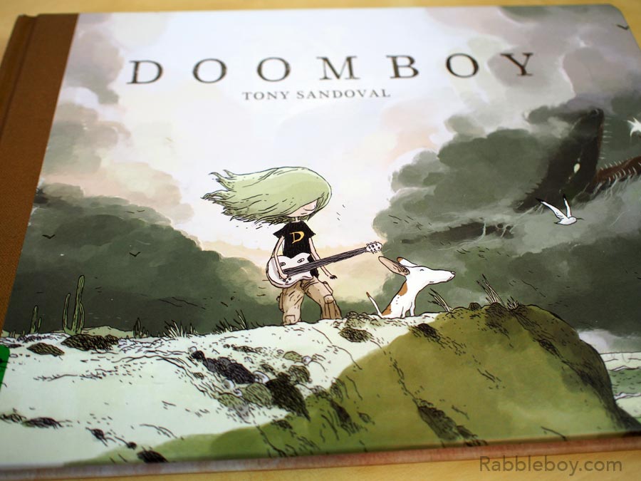 Let’s look at Doomboy Graphic Novel by Tony Sandoval. A Rockin book!